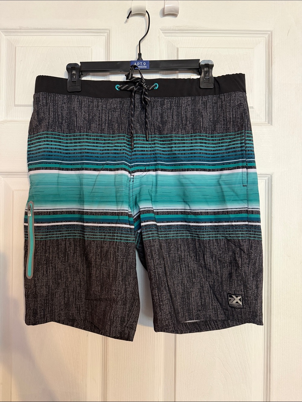 ZeroXposur Black with Teal Striped Men’s Board Shorts